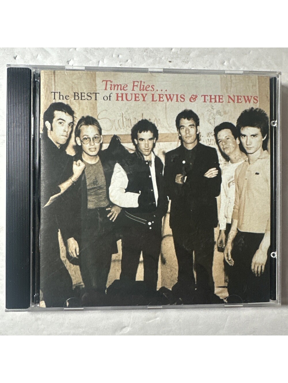 Time Flies: The Best of Huey Lewis and the News CD mint disc